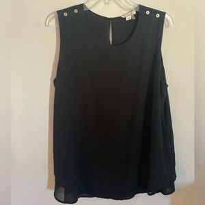 Womens flowy sleeveless shirt with button detail